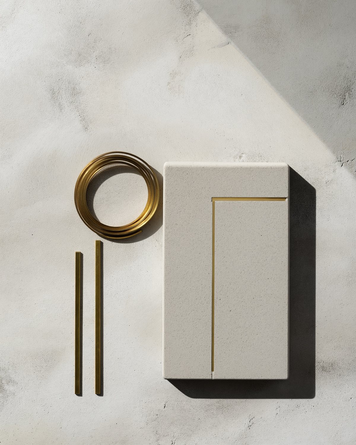 The gold line kit laid out on a bench: brass inlay, divider strips, diamond tooling