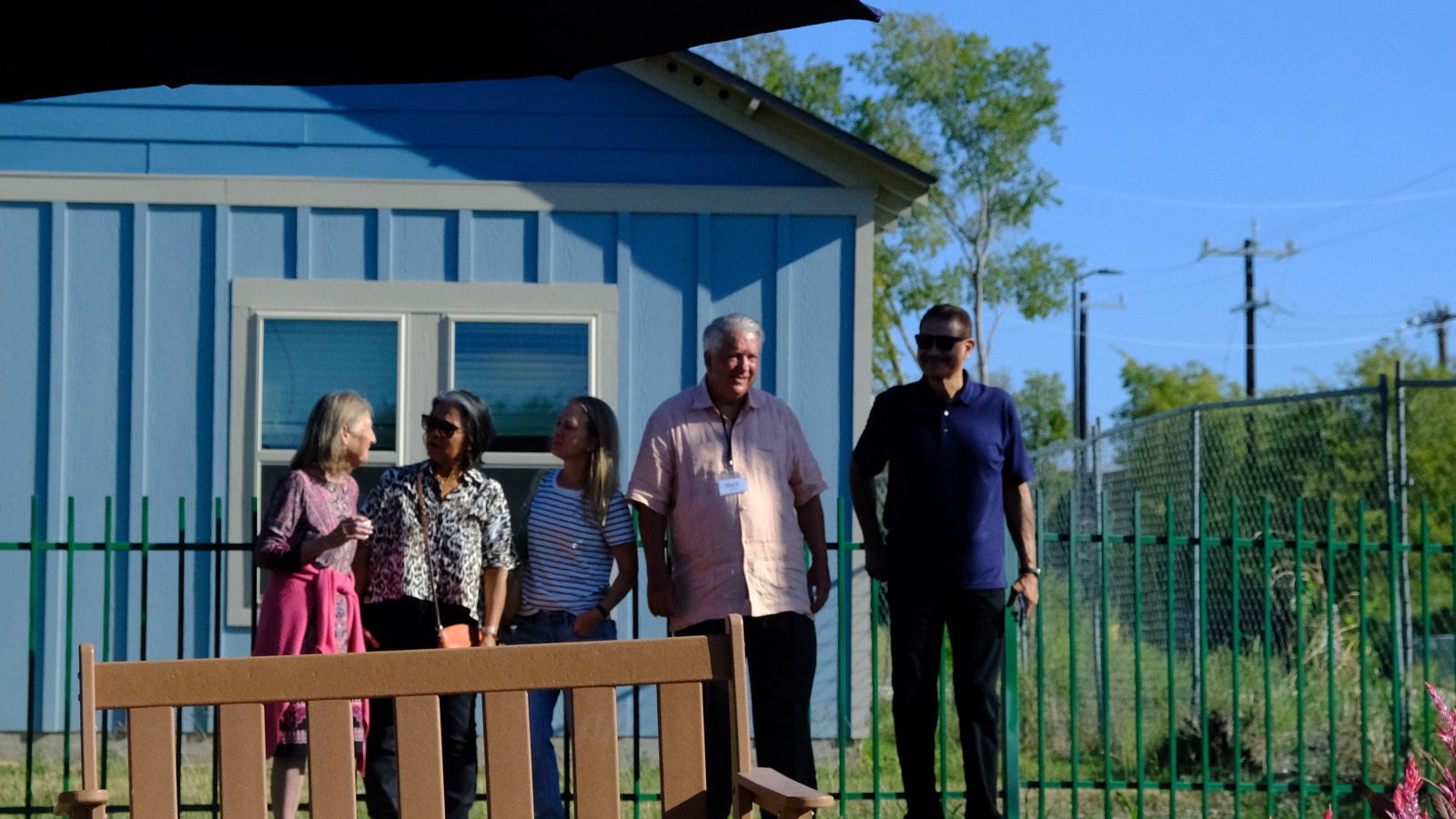 Community members and a sponsor at the opening of the restored garden