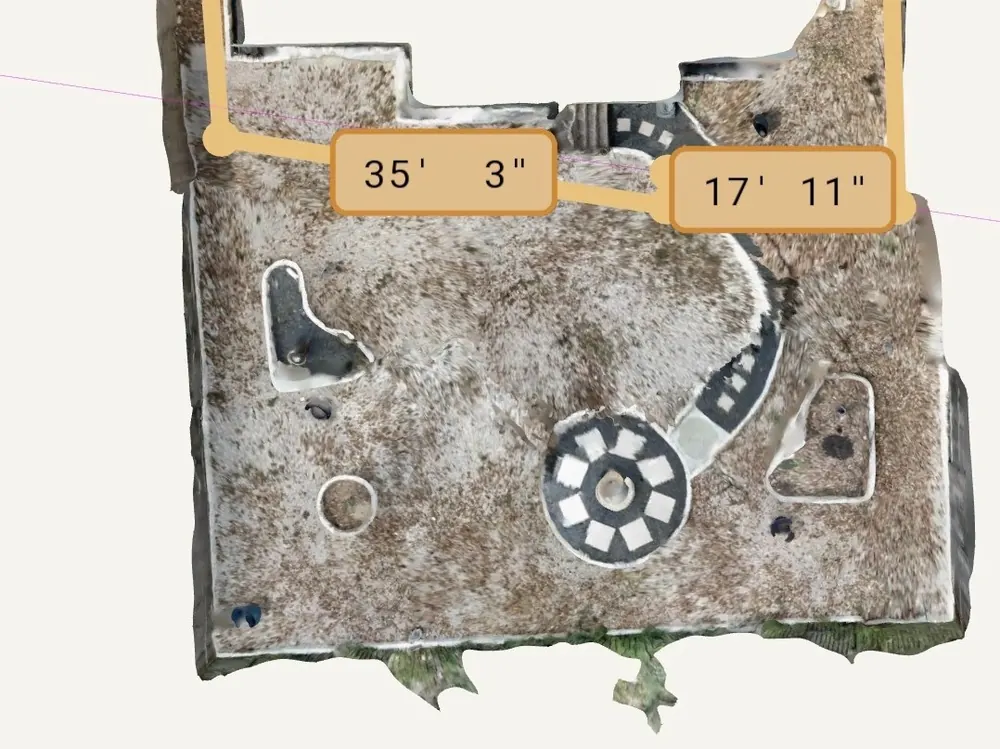 A photo-textured LiDAR plan of a back yard with field dimensions tagged.