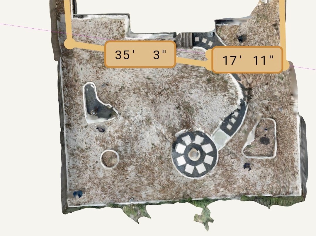 A photo-textured LiDAR plan of a back yard with field dimensions tagged.