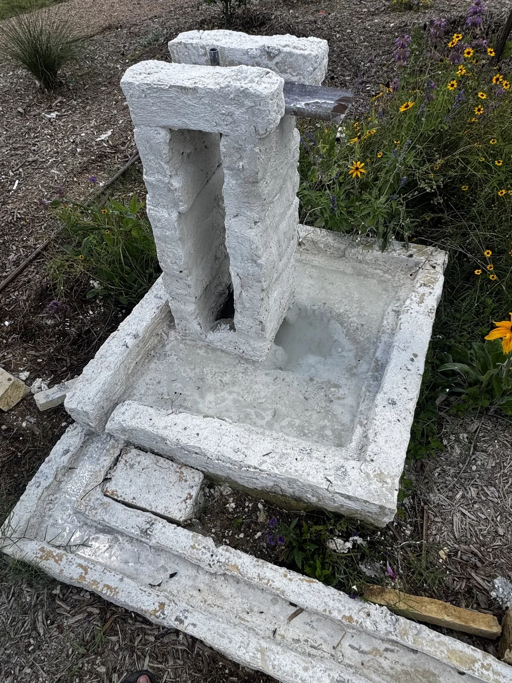 A cast concrete fountain and basin, made by hand at Towne Twin.