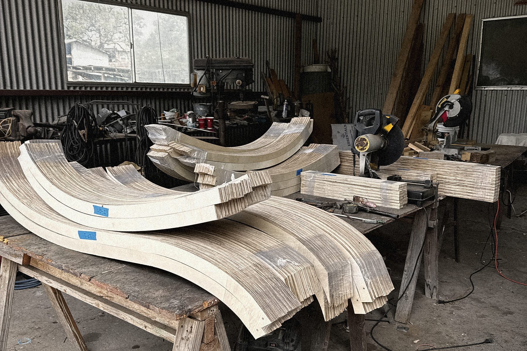 The ribs in the shop: laminated birch, bent to the drawing on a jig made for each curve.