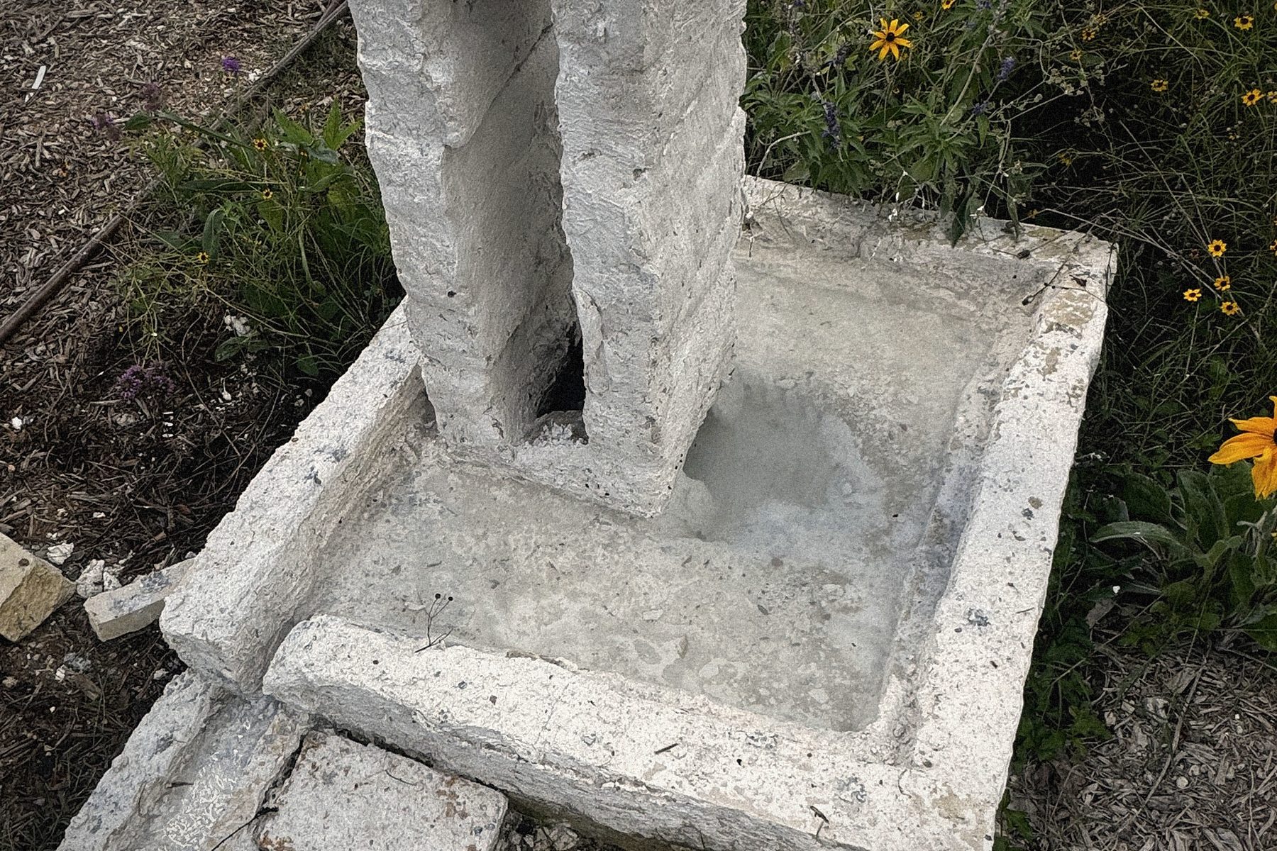 A fountain cast on site, one of three.