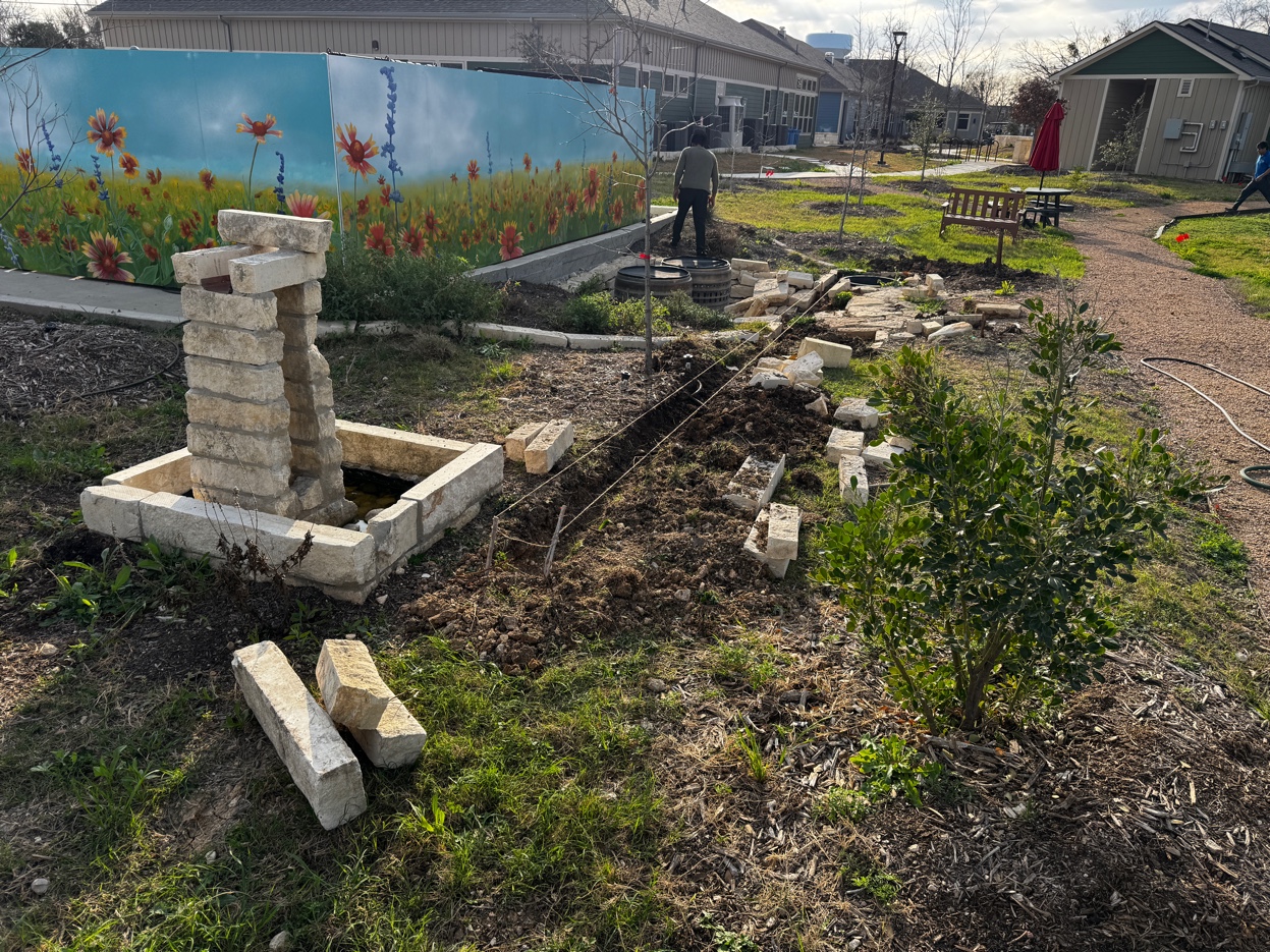 Towne Twin Village — Castellum fountain and food beds under construction, San Antonio TX
